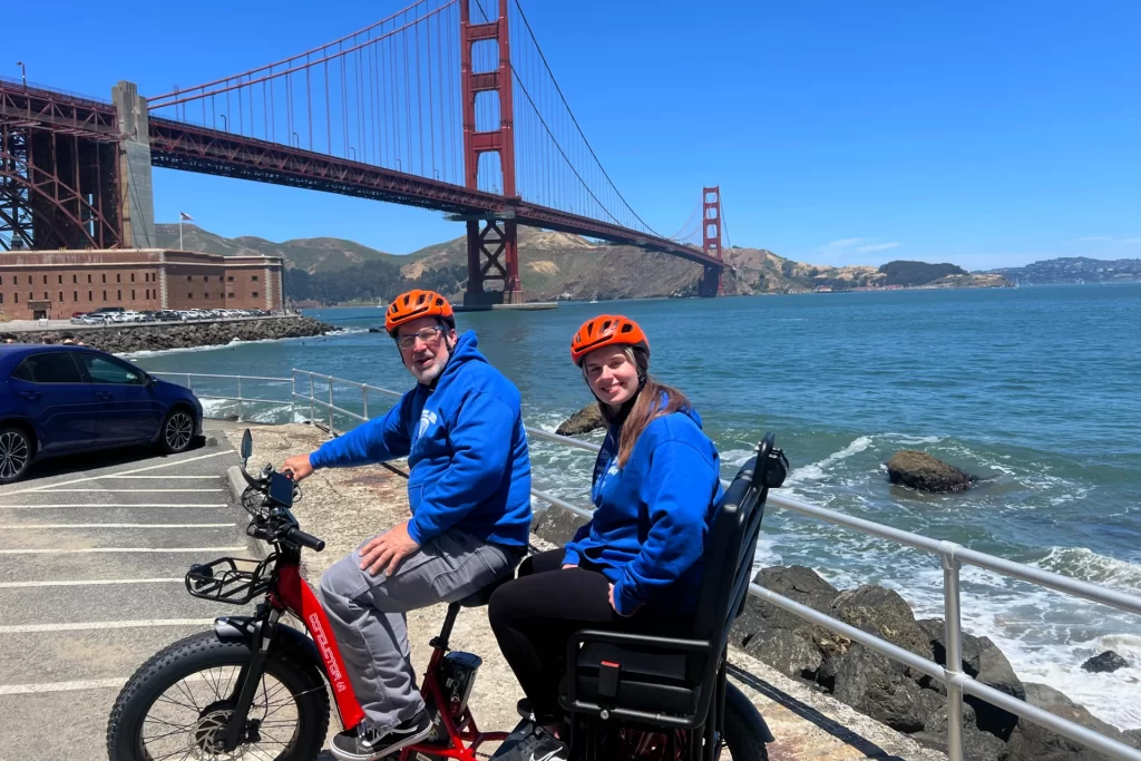 Golden Gate Bridge view Three person rickshaw E-Trike rental in San Francisco with GPS Tour onboard